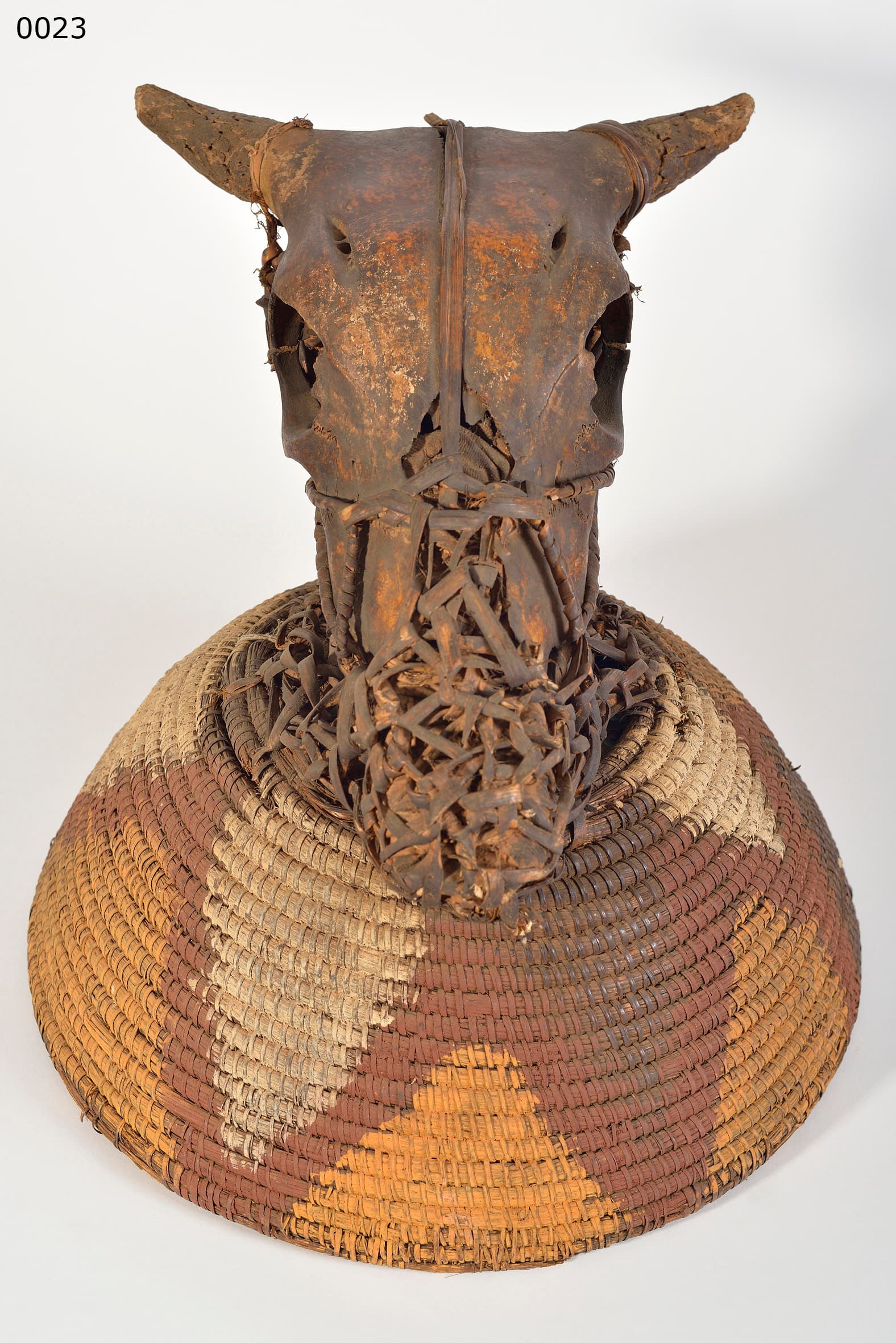 IGBO — shrine altar (animal scull on plaited basket socle)
