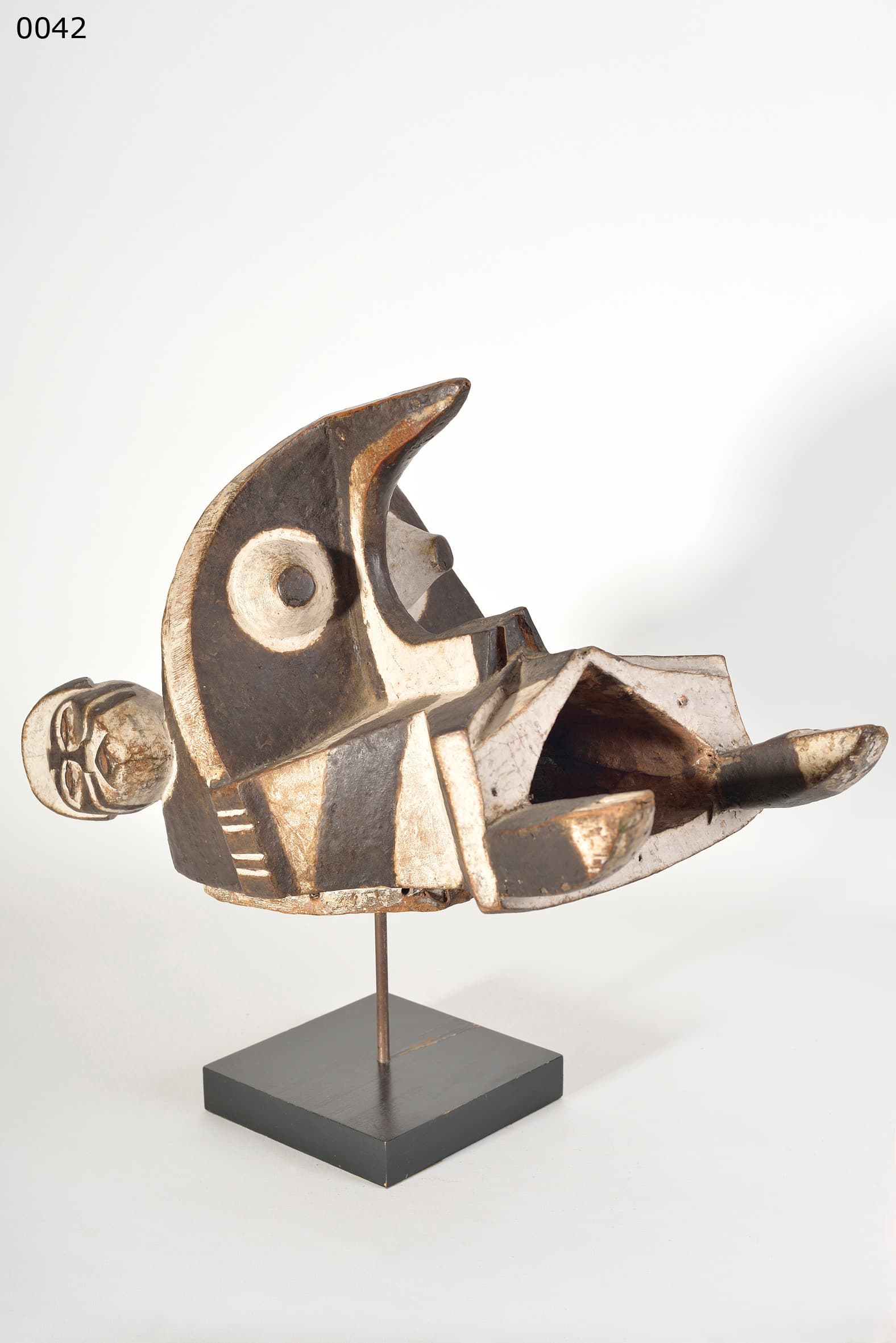 IGBO/IZI — headcrest mask with multiple faces (called elephant mask)
