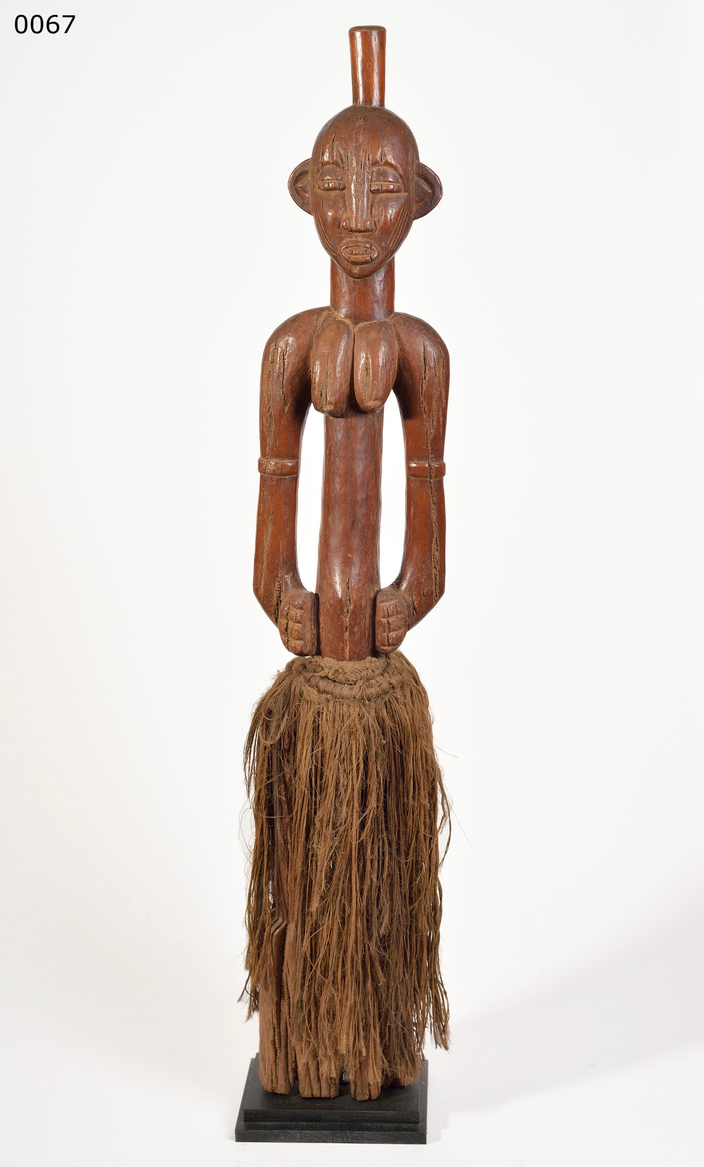 Senufo — female rythm pounder (called POMBIBELE)