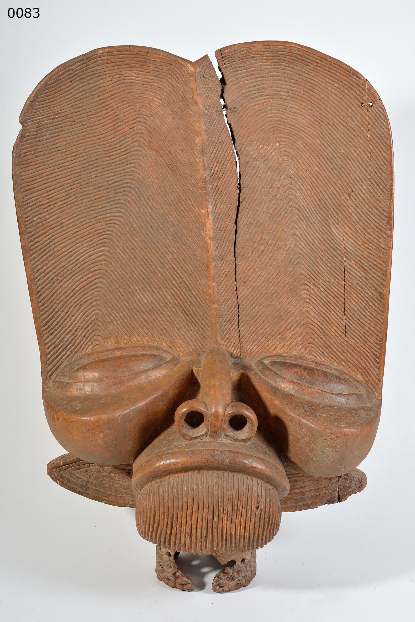 BAMILEKE — headcrest or shoulder mask (called BATCHAM or TSEMABU), published in "AFRICANA" p. 178 and "KOPFSKULPTUREN" p. 142
