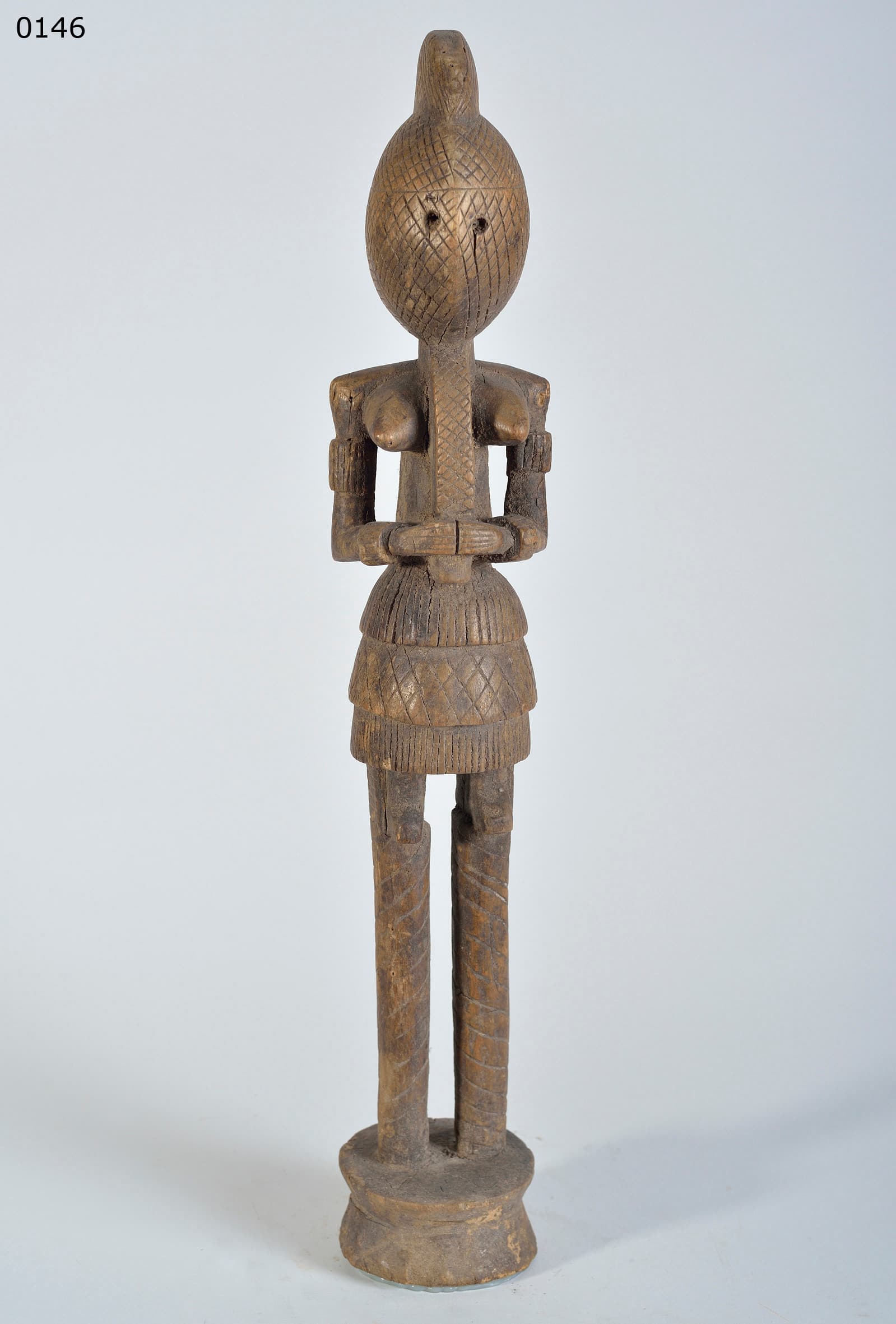 MOSSI — female masked figure