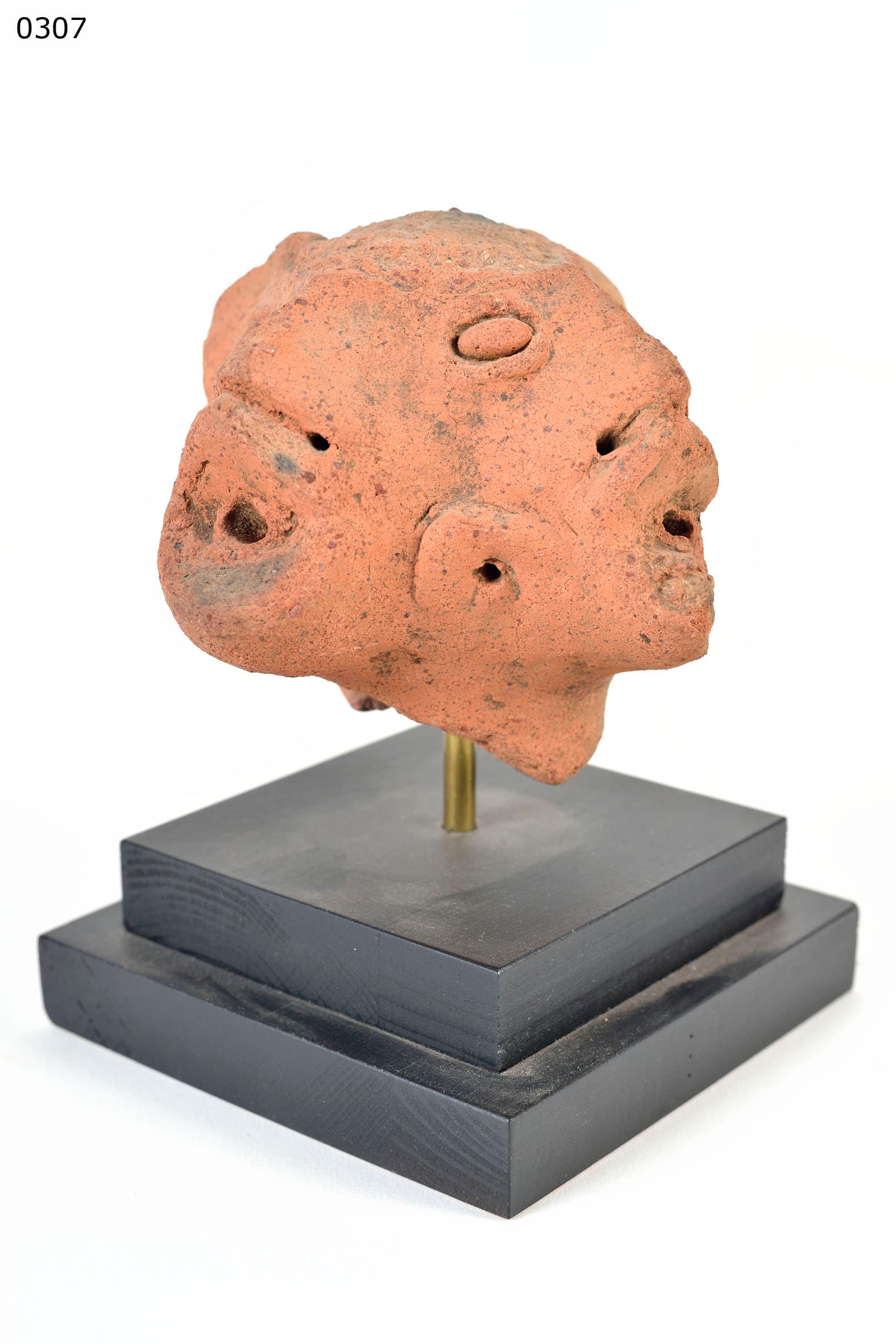 Koma — head of tomb figure with four faces (rare)